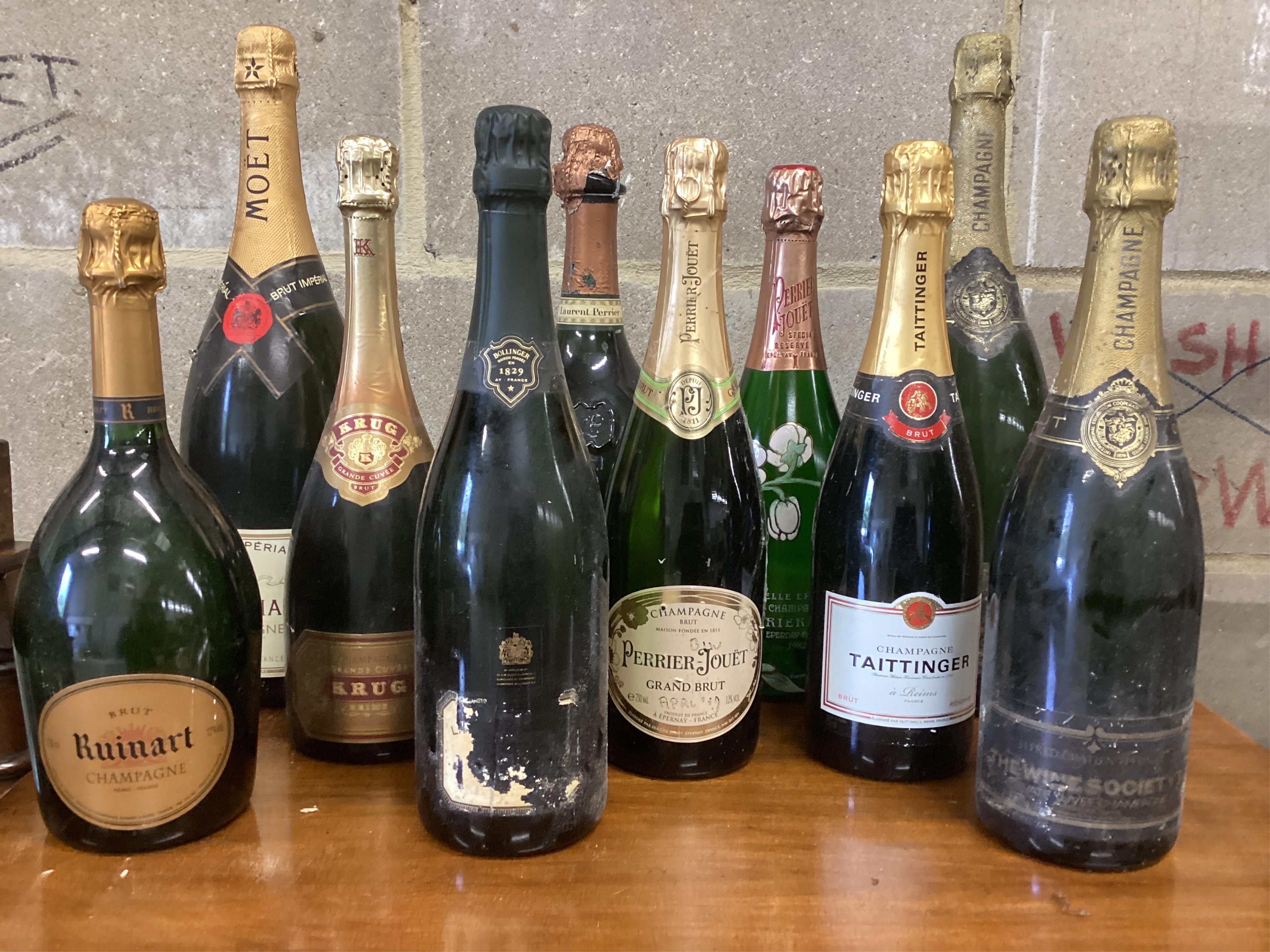 Ten bottles of assorted champagne to include Krug, Taittinger, Laurent-Perrier and Moët. (From a local private cellar). Condition - some labels degraded